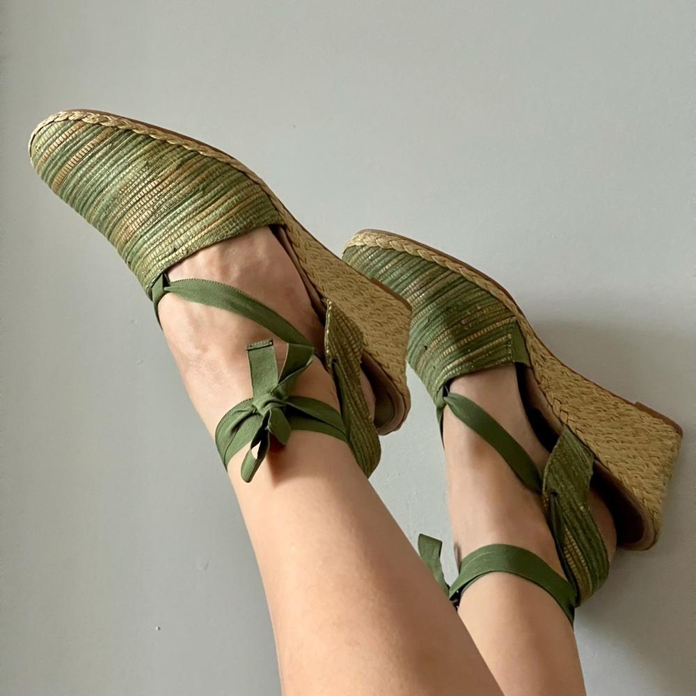 Green espadrille wedges with ankle straps.